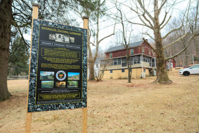 An anthracite cultural landmark sign stands in front of a newly renovated home at The Village At Houser's Crossing in Tamaqua, PA.