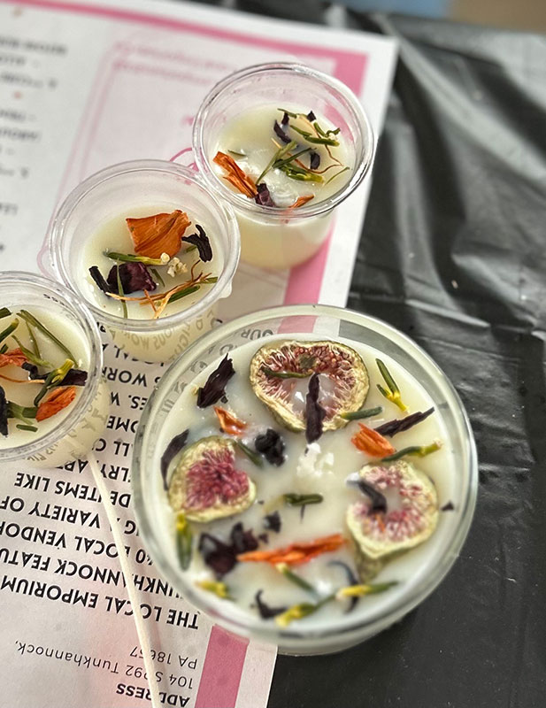 Finished handmade candles in mason jars from a candle making class at the Local Emporium in Tunkhannock, PA.