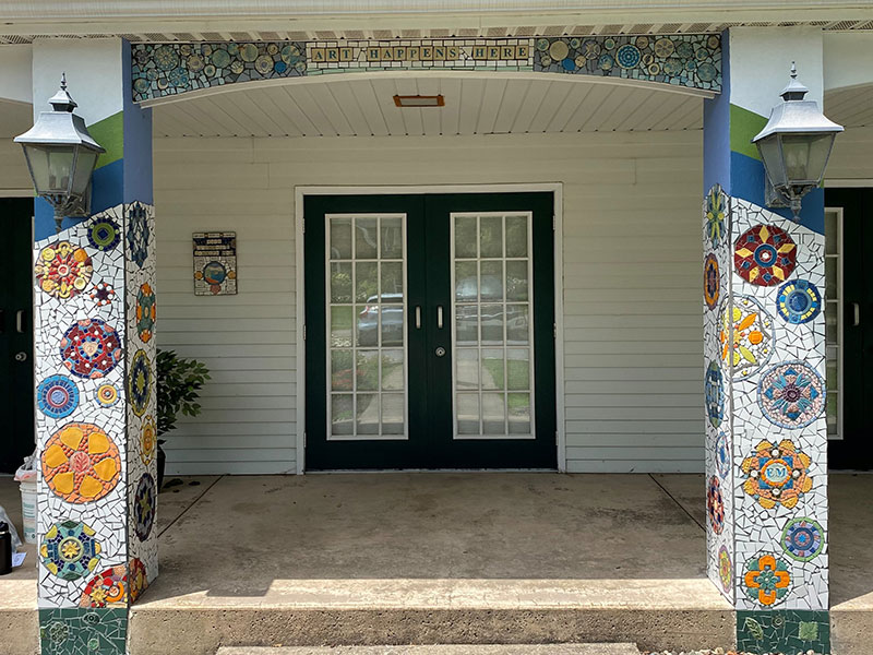 A view of the artistic mosaic tiled pillars at the entrance of the David A. DeWire Center in Eagles Mere, PA.