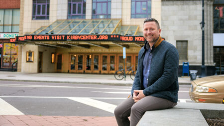 Mike McGinley poses in front of the F.M. Kirby Center in Wilkes-Barre, PA.