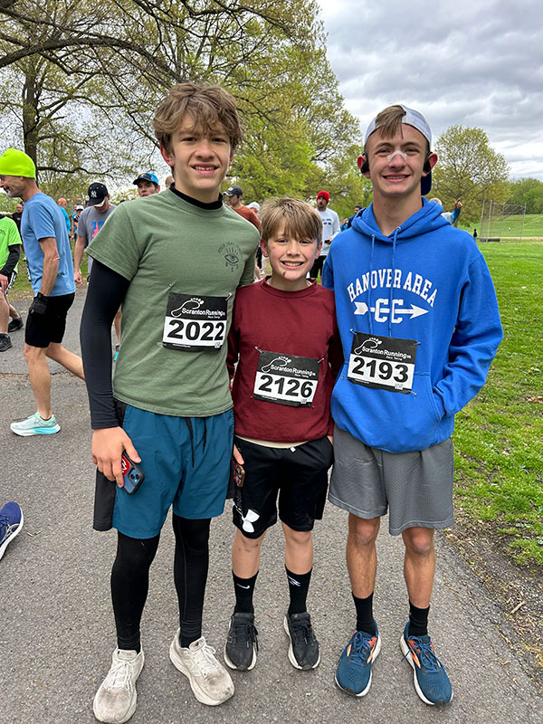 Hanover Area runners gather before the start of the Wyoming Valley Striders’ Cherry Blossom 5-Miler in April 2025.