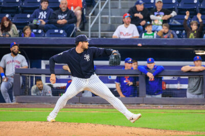 A pitcher is about to release the ball at PNC Field in Moosic, PA.