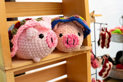 Two crocheted pigs at I Love Bacon Fest in Forty Fort, PA.