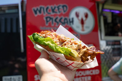 A lobster roll with bacon from Wicked Pissah Lobster Truck.