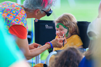 A girl gets her face painted during the 2025 River of the Year celebration at Minisink Park in East Stroudsburg, PA.