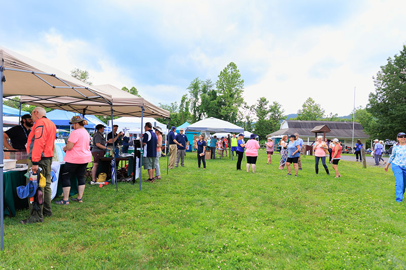 A wide angle look at the vendor setups during the 2025 River of the Year celebration at Minisink Park in East Stroudsburg, PA.