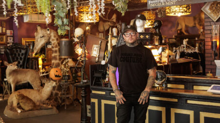 Josh Balz, owner of The Strange & Unusual oddities shop poses for a photo at The Strange & Unusual in Kingston, PA.