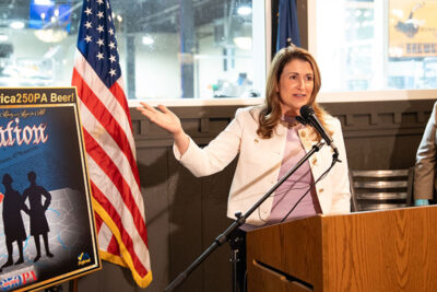 A Senator Rosemary M. Brown speaks at a podium
