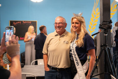 Ms. PA poses with a fan