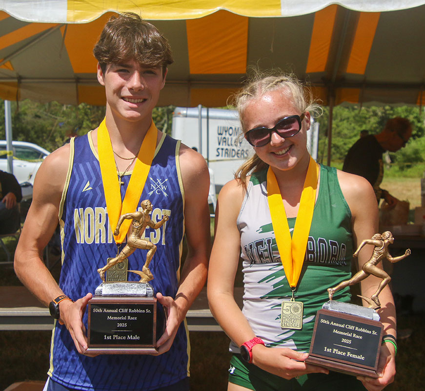 Photographed are the top male and female winners of the annual Cliff Robbins Sr. Memorial, hosted by the Wyoming Valley Striders in Dallas, PA.