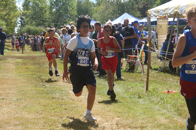 Teen boys race in the annual Cliff Robbins Sr. Memorial, hosted by the Wyoming Valley Striders in Dallas, PA.