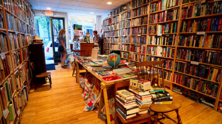 Woman entering Sellers Books, and independent bookstore in Jim Thorpe, PA.