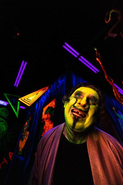 An actor dressed as a clown stares creepily into the distance at Reaper's Revenge in Scott Twp., PA near Scranton.