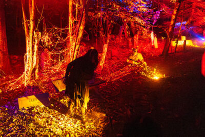 An actor dressed in black tattered robes limps toward the hayride at Reaper's Revenge in Scott Twp., PA near Scranton.