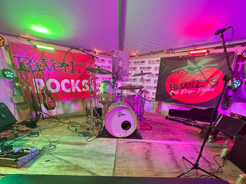 Instruments set up on stage at Revellos Pizza in Old Forge, PA.