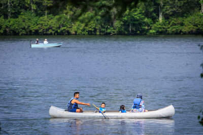 A family canoes at Tobyhanna State Park in Tobyhanna, PA.