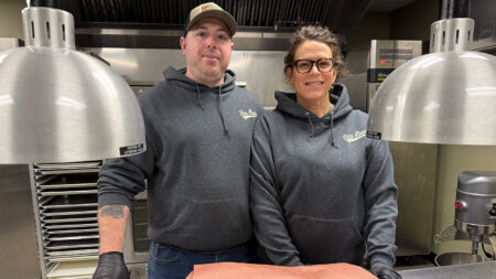 Husband-and-wife owners of Bees Knees BBQ pose at the Kitchen Incubator in Hazleton, PA.