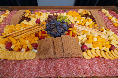 A cheese and charcuterie tray displayed for guests at the ribbon cutting for Madame Jenny's in Scranton, PA.