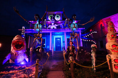A festive home decorated skeletons and sharks in Halloweentown in West Pittston, PA.