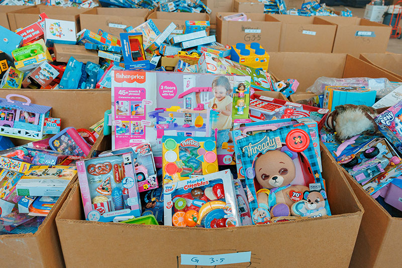 Large boxes packed with donated children’s toys fill the warehouse during Toys for Tots, Wyoming, PA.