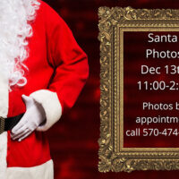 Flyer showing Santa’s suit beside a gold frame listing Santa photo appointments on December 13 from 11:00 to 2:00.