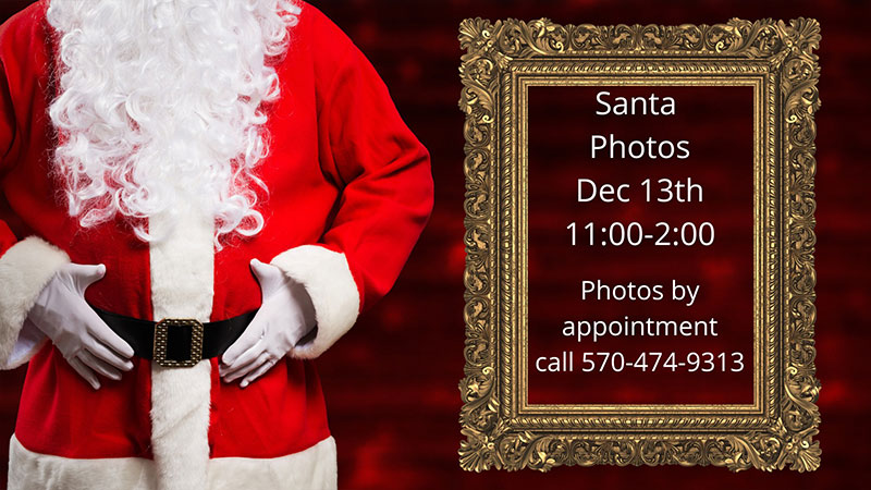 Flyer showing Santa’s suit beside a gold frame listing Santa photo appointments on December 13 from 11:00 to 2:00.
