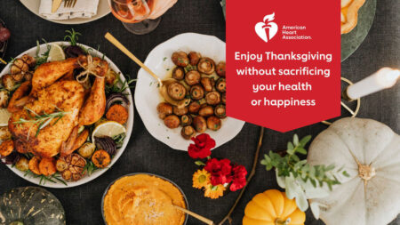 A view of a table with all of the Thanksgiving staples like turkey, stuffing, potatoes for the American Heart Association's heart-healthy Thanksgiving guide.