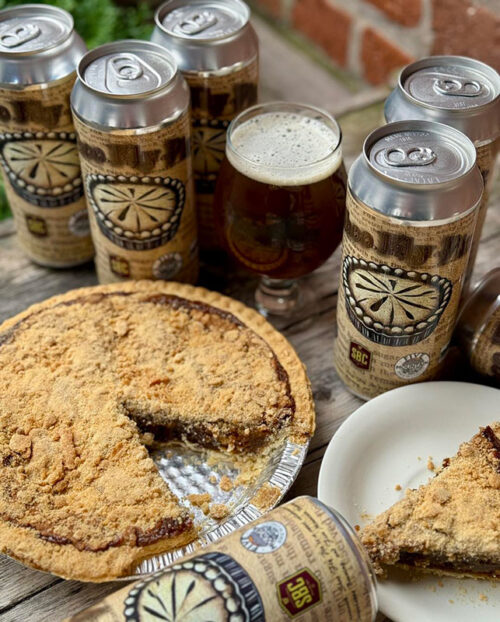 A fresh pint and a few cans around a shoofly pie on a table at Breaker brewing Company in Wilkes-Barre Twp., PA.