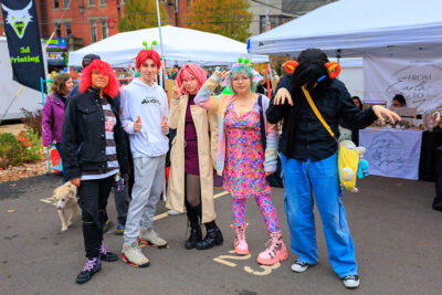 A group dressed alien attire pose for the camera at the second annual Carbondalien Festival in Carbondale, PA.