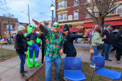 Two people dressed alien attire pose for the camera at the second annual Carbondalien Festival in Carbondale, PA.
