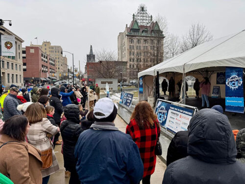 A crowd gathers at the main stage for the opening ceremonies at Downtown on Ice in Scranton, PA.