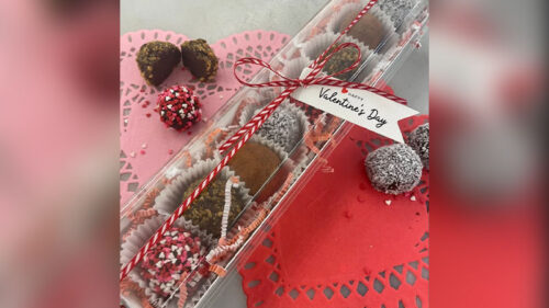 Galentine’s to Valentine’s truffle gift box from Poiema Sweets at Benigna’s Creek Vineyard and Winery in Klingerstown, PA, with Valentine’s Day tag and assorted chocolates.