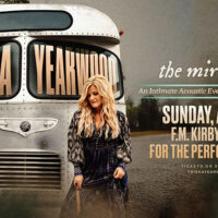 Trisha Yearwood The Mirror Tour spring concert at the F.M. Kirby Center for the Performing Arts in Wilkes-Barre on Sunday, April 12, 2026, featuring Trisha Yearwood standing beside a vintage bus. Text on image reads: “Trisha Yearwood,” “the mirror tour,” “An Intimate Acoustic Evening of Stories & Songs,” and “Sunday, April 12 F.M. Kirby Center for the Performing Arts.”