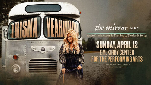 Trisha Yearwood The Mirror Tour spring concert at the F.M. Kirby Center for the Performing Arts in Wilkes-Barre on Sunday, April 12, 2026, featuring Trisha Yearwood standing beside a vintage bus. Text on image reads: “Trisha Yearwood,” “the mirror tour,” “An Intimate Acoustic Evening of Stories & Songs,” and “Sunday, April 12 F.M. Kirby Center for the Performing Arts.”