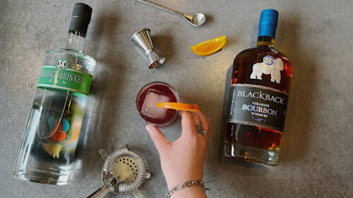 Valentine’s Day Old Fashioned Cocktail Class at Silverback Distillery in East Stroudsburg, PA, featuring bourbon bottles, cocktail tools, and a mixed drink.