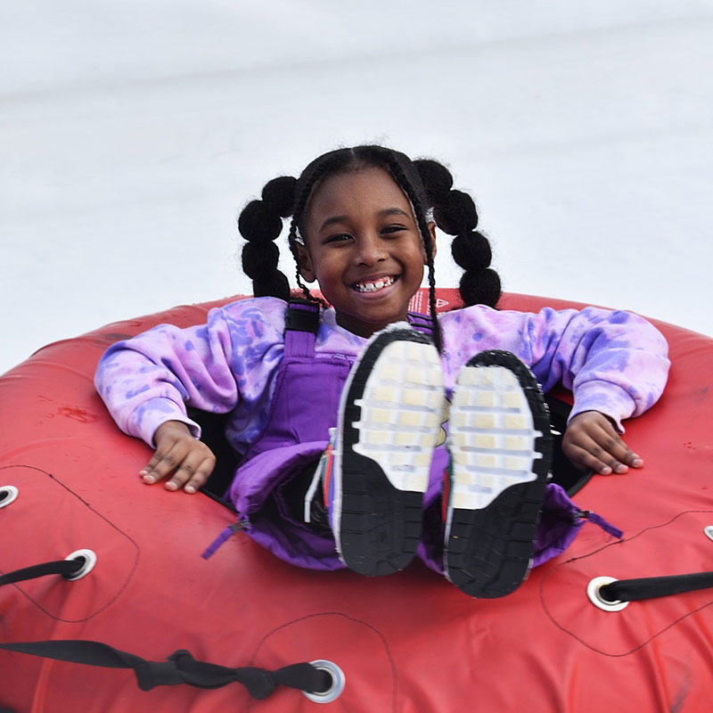 A child snow tubes down the hill at Shawnee Mountain Ski Area in East Stroudsburg, PA.