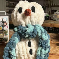 A small knit snowman from the Cozy hand knit snowman workshop at Back Mountain Makery in Dallas, PA.
