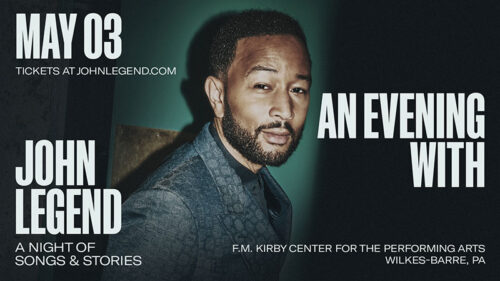 John Legend: An Evening of Songs & Stories spring concert at the F.M. Kirby Center for the Performing Arts in Wilkes-Barre, PA on May 3, 2026, featuring a portrait of John Legend. Text on image reads: “May 03,” “John Legend,” “An Evening With,” “A Night of Songs & Stories,” “F.M. Kirby Center for the Performing Arts Wilkes-Barre, PA,” and “Tickets at JohnLegend.com.”