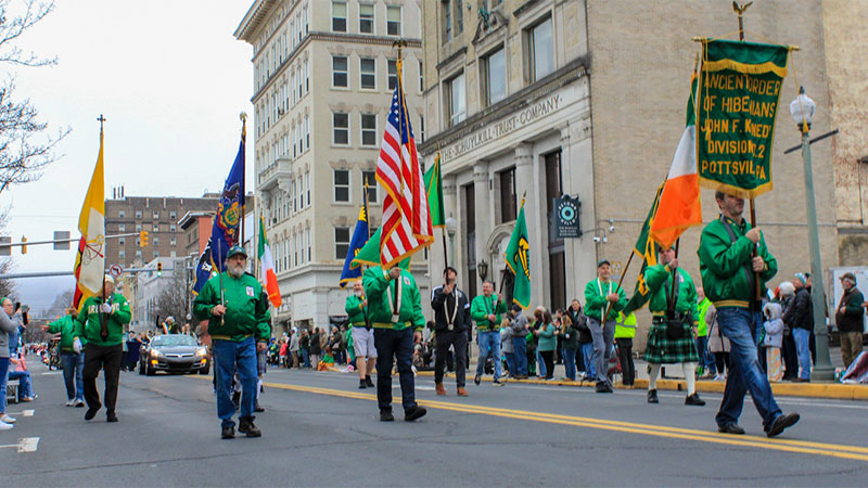 Participants dressed in green march through downtown Pottsville during the annual St. Patrick’s Day Parade.