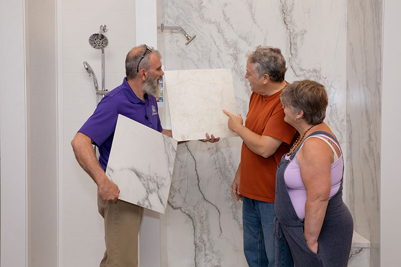 Customers check out tile samples at Perfect Storm Kitchen & Bath in Pittston Twp., PA.