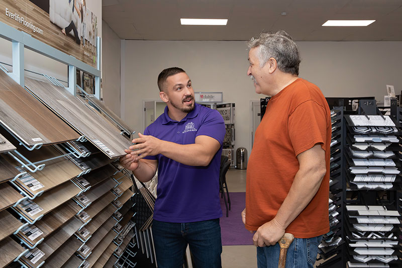 A sales rep helps a customer at Perfect Storm Kitchen & Bath in Pittston twp., PA.