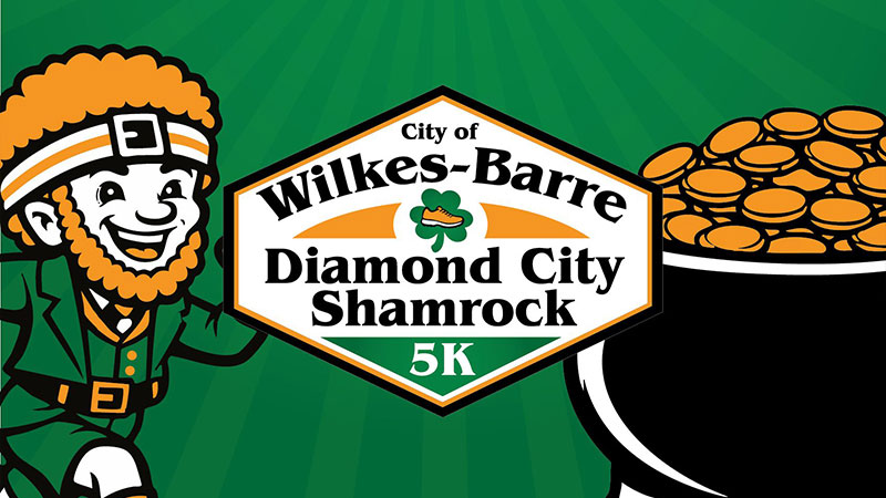 Diamond City Shamrock 5K at Public Square in Wilkes-Barre, PA, takes place on March 15 and is represented by a cartoon leprechaun beside the event logo on a green background.