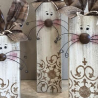 Three wood craft bunnies on display from the Wood Bunny trio class held at The Crooked Branch in West Pittston, PA.