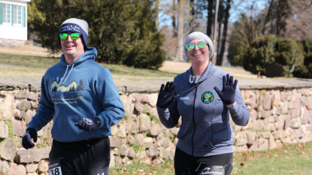 A couple smiles while out for a run with the Wyoming Valley Striders.