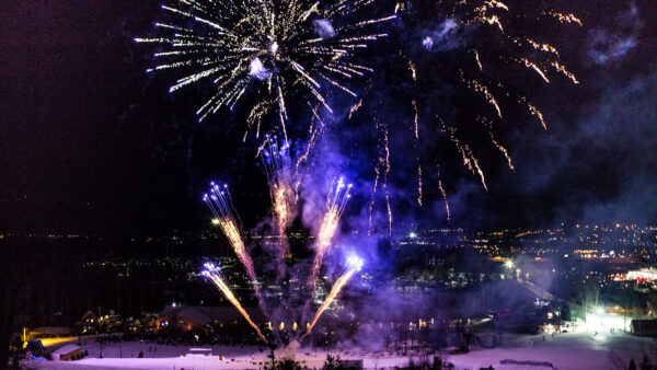 Drone shot of fireworks display at the Presidents Weekend Torchlight Parade at Montage Mountain ski resort in Scranton, PA.