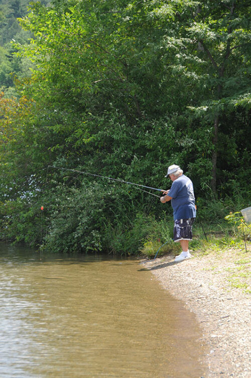 A fisherman prepares to cast his line at Beltzville State Park in Lehighton, PA.