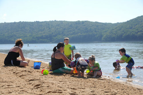 A family enjoys a beach day at Beltzville State Park in Lehighton, PA.