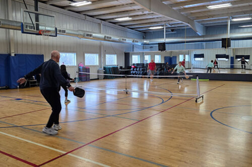 A group plays indoor pickleball at Danko's All American Fitness in Plains, PA.