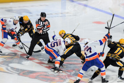 Hockey players faceoff at the WIlkes-Barre/Scranton Penguins game in Wilkes-Barre, PA.