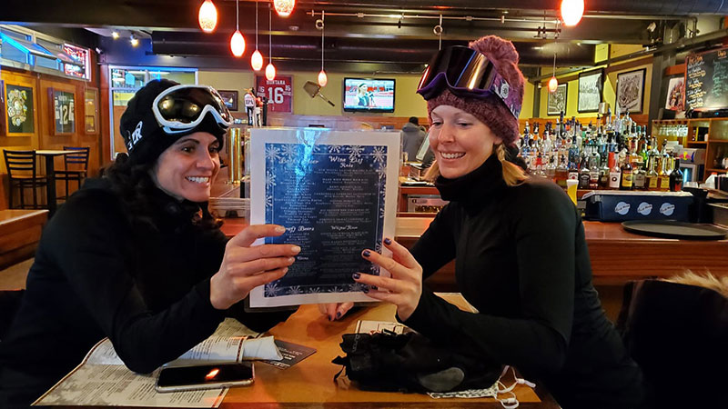 Two women dine at a restaurant at Ski Big Bear in Lackawaxen, PA. 